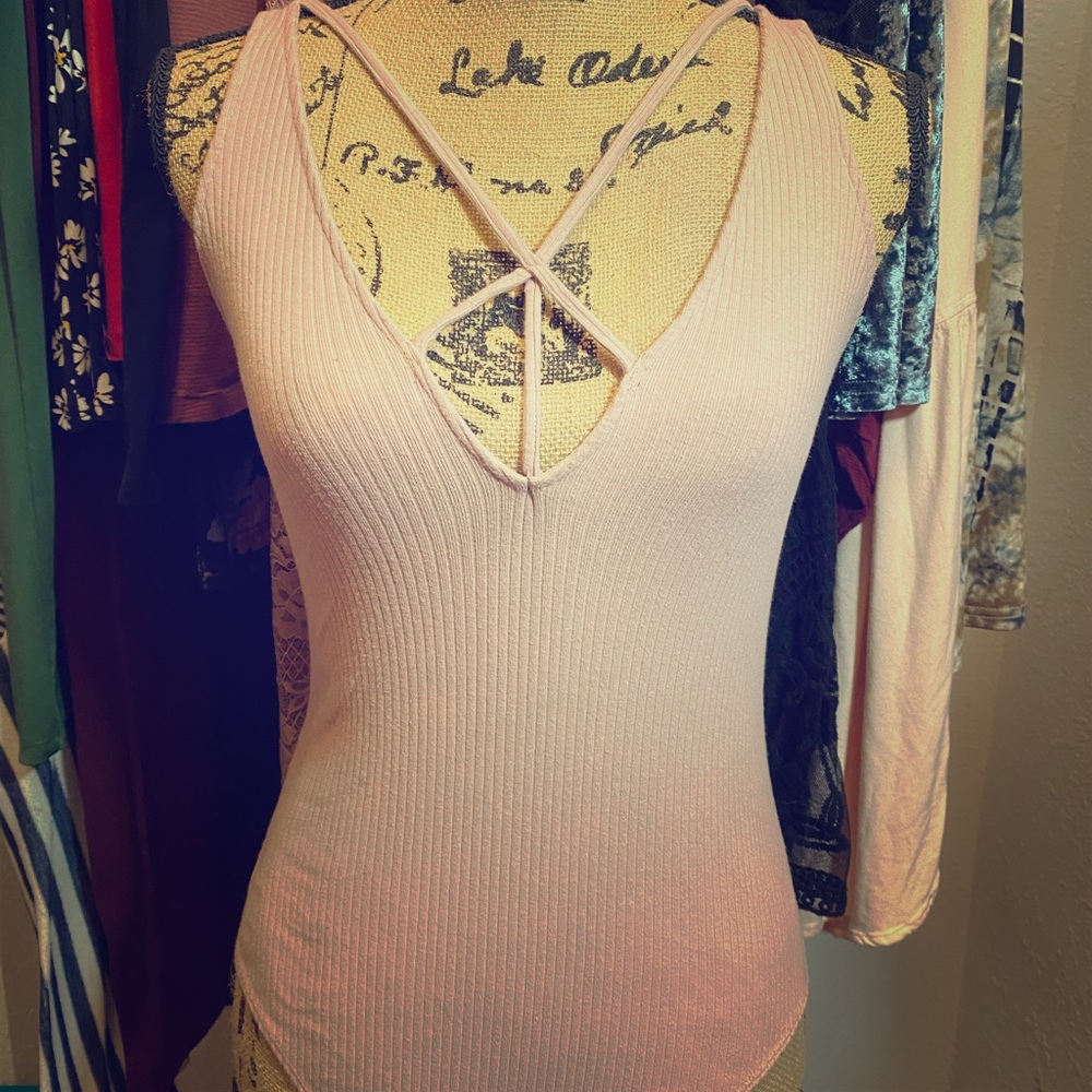 Pink body suit